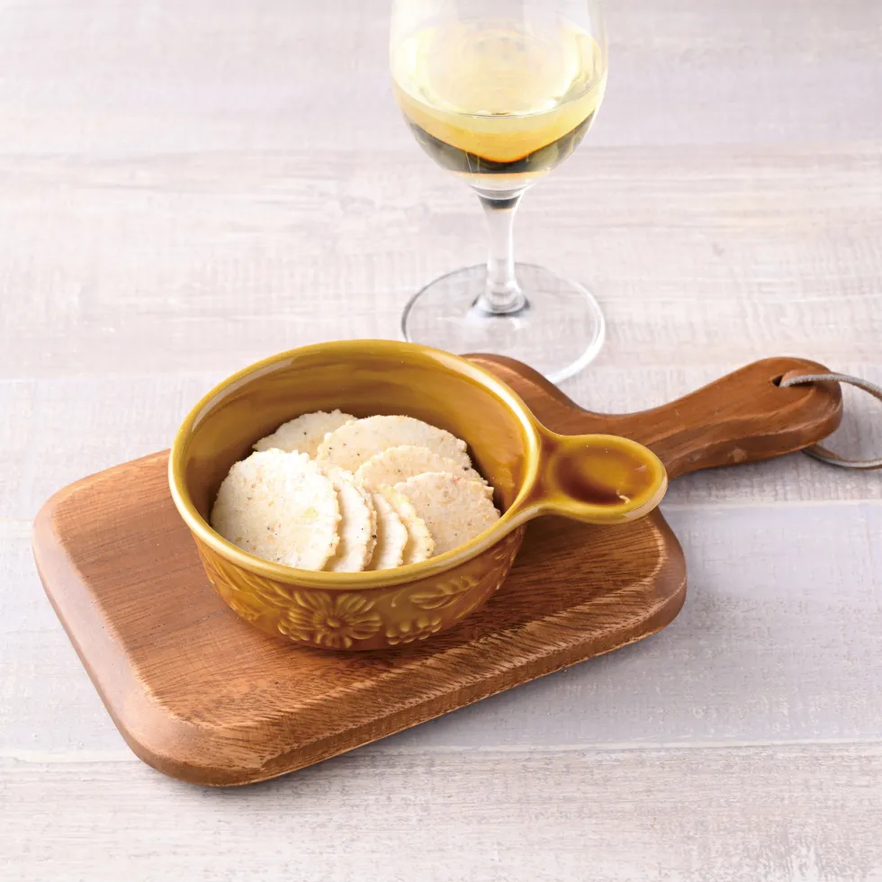 VivaEvi(ヴィヴァエビ）の商品画像。ラクレ・メルチーノは、白ワインとの相性が良いえびが主原料のおせんべい。